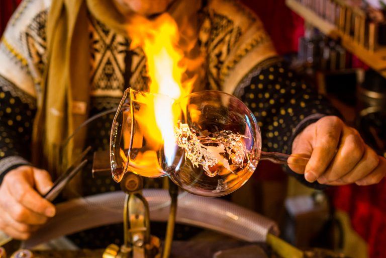 glass blower making the flass bubble